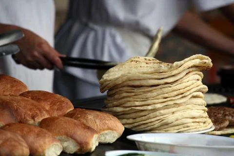 Baker with bread Stock Photos