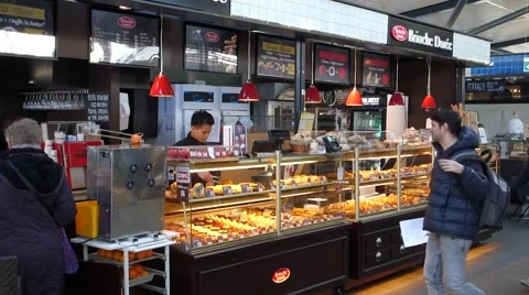 The baker café Brioche Dorée at the covered market Torvehallerne in Copenhagen Video stock 60852464