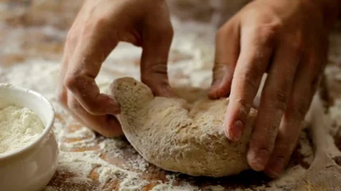 Baker chef man kneading flour making fresh dough for baking homemade cookin.. Video stock 272468302