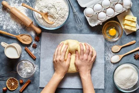 Baker chef preparing homemade dough bread, pizza or pie recipe ingridients, food Stock Photos