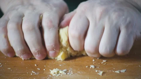 Baker chef stirs dough to make pie, cake, pizza, bread. Pie and bakery products. Stock-Footage 124752656