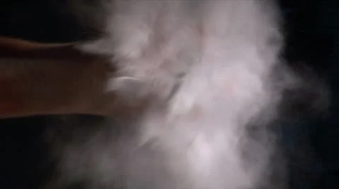 Baker clapping with flour powder in hands slow motion 10816 Stock Footage 12671904