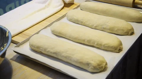 Baker Corrects Dough in the kitchen Stock Footage 60484227