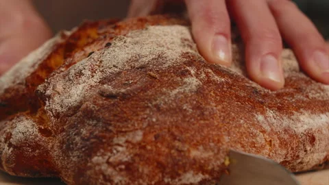 Baker cuts corn bread with a knife Stock Footage 201548124
