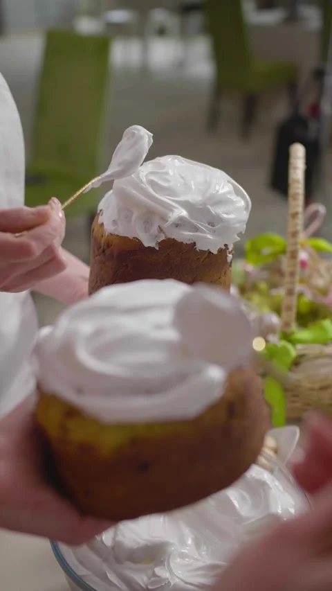 Baker Decorating Easter Bread With White Royal Icing Stock Footage 341417569