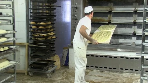 Baker Fires a Crushed Pan Stock Footage 92498513