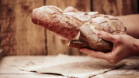 Baker with fresh bread Video stock 71903393