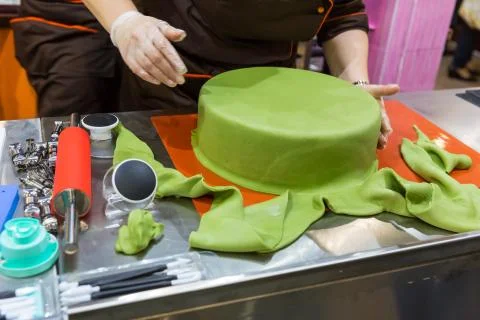 Baker with gum paste Stock Photos