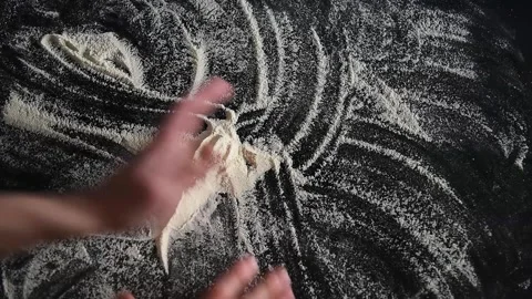 Baker hand with flour Stock Footage 158871757