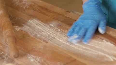 Baker hand preparing dough before rolling for pastries on table in bakery shop Stock Footage 90680620
