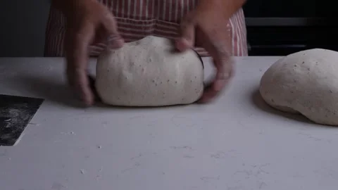 Baker hand preparing Raw Fresh Sourdough bread. Stock Footage 305981336