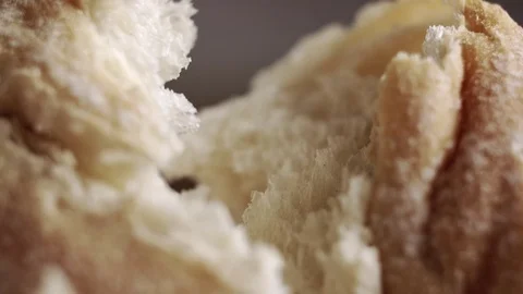 Baker hands breaking homemade bread. Close up view Video stock 74197086