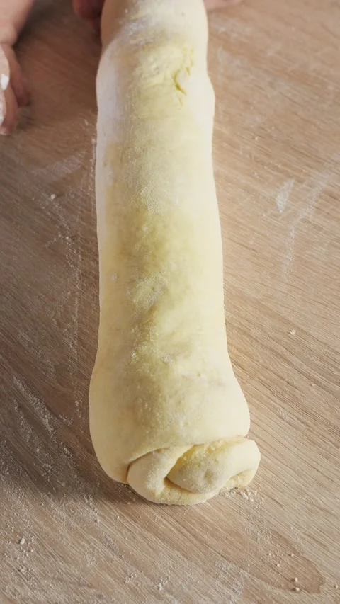 Baker hands kneading and rolling dough Stock Footage 341444956
