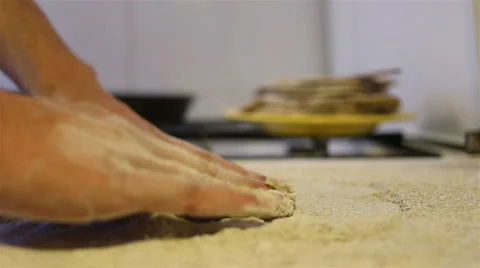 Baker hands kneading dough in flour on table Stock Footage 67479930