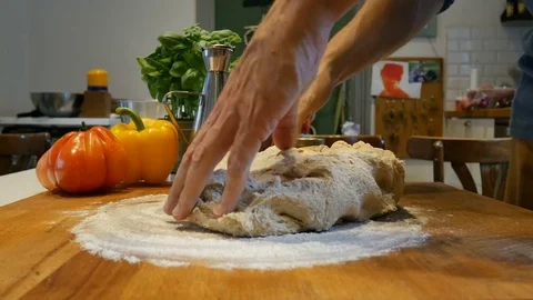 Baker Hands Kneading Dough In Flour On Table, 4K Stock Footage 77094475