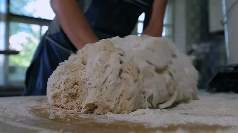 Baker Hands Kneading Dough In Flour On Table 스톡 동영상 89576433