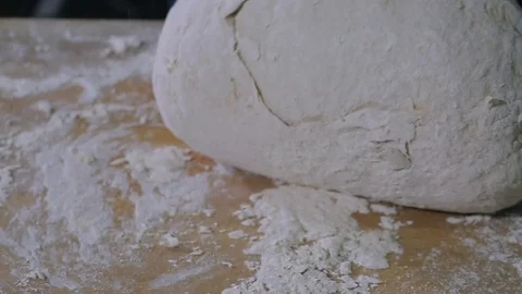 Baker Hands Kneading Dough In Flour On Table 스톡 동영상 89576490