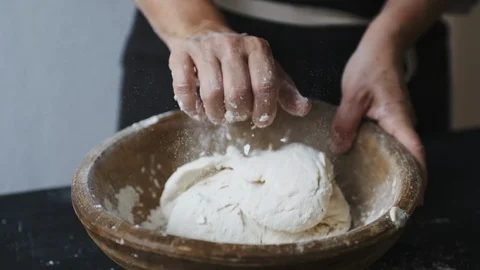 Baker hands kneading dough 스톡 동영상 91984200