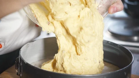 Baker hands mixes dough for the pie, cake, bread, pizza, pancakes. Stock-Footage 124751602