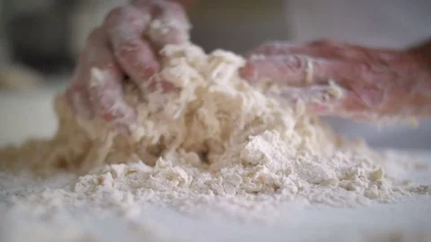 Baker hands preparing the dough 스톡 동영상 76559478