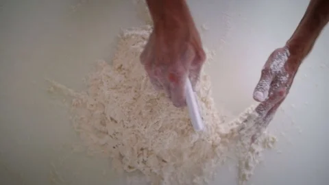 Baker hands preparing the dough Stock Footage 76560096