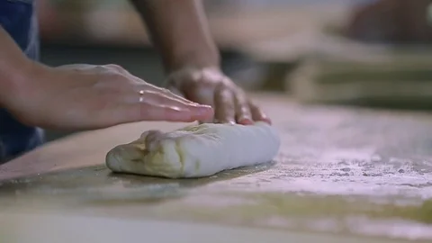 Baker Hands Rolling And Shaping Dough Bread Stock Footage 89577080