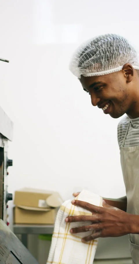 Baker, happy and face of man in kitchen with bread for confidence with catering Stock Footage 335113461
