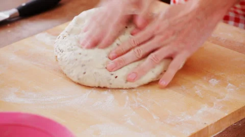 Baker kneading bread dough Stock Footage 35844037