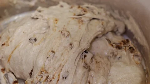 Baker Kneading Chocolate Chip Dough by Hand Stock Footage 340933377