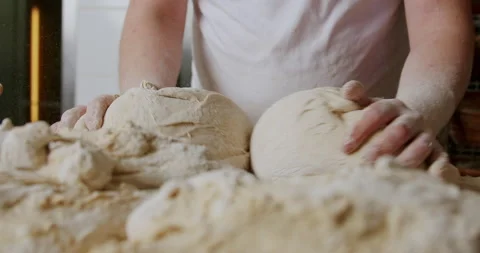 Baker  kneading the dough 4K. Stock-Footage 221561328