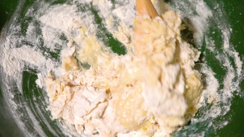 Baker kneading dough in flour on table. Stock-Footage 249173449