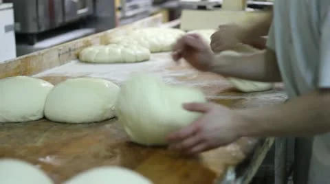 Baker kneading dough Stock Footage 12657290