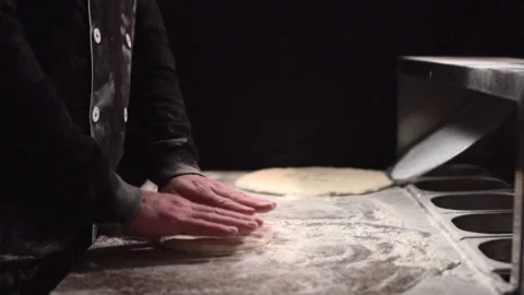 The baker is kneading the dough. 스톡 동영상 145355483