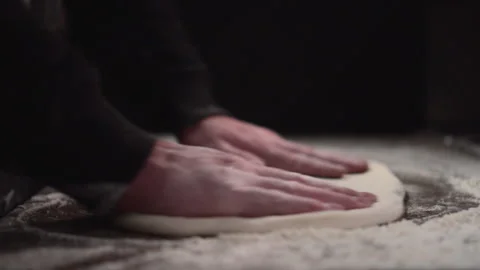 The baker is kneading the dough. Stock Footage 146584450
