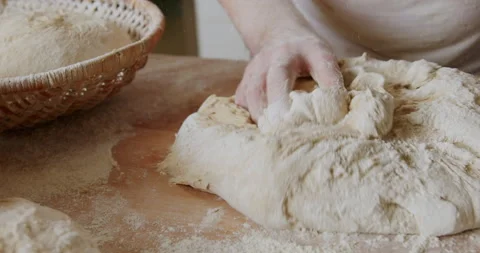 Baker kneading the dough, making bread 4K. Stock Footage 221561789
