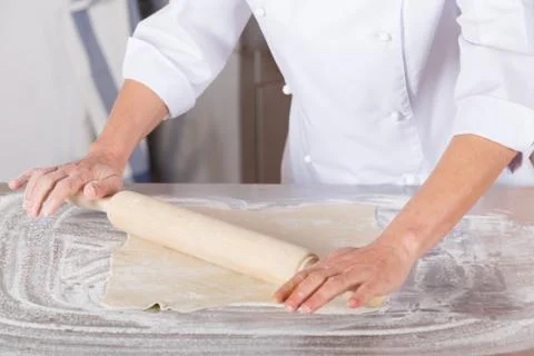 Baker kneading dough Foto stock