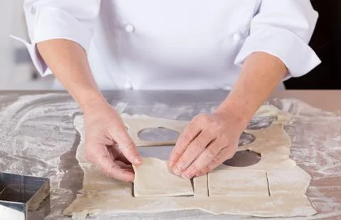 Baker kneading dough Foto stock