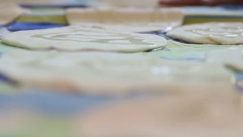 Baker kneading dough with rolling pin on table. Woman rolling dough for pizza. R Stock Footage 90735591