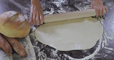 Baker kneading dough with rolling pin. Stock Footage 138696600