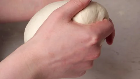 Baker kneading dough in slow motion Stock Footage 306195128
