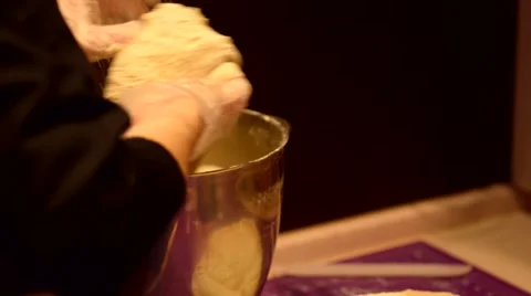 Baker kneading dough on table Vídeos de archivo 59577907