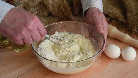 The baker kneads the dough for baking. Stock Footage 154316710