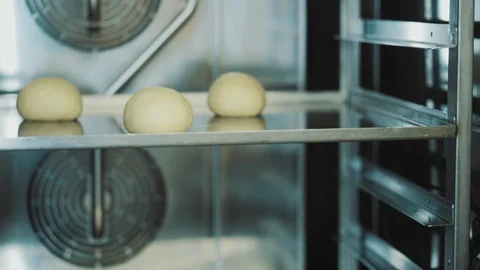 Baker kneads dough for bread baking Stock Footage 89526355