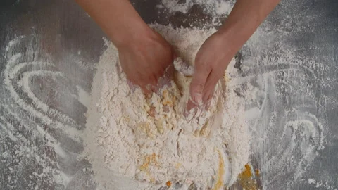 The baker kneads the dough for bread. view from above Video stock 201547910