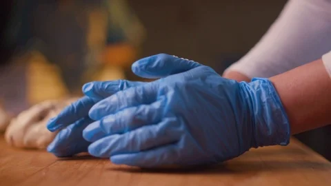 The baker kneads the dough for the cake. Stock Footage 123649738