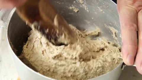 The baker kneads the dough Stock Footage 79885048