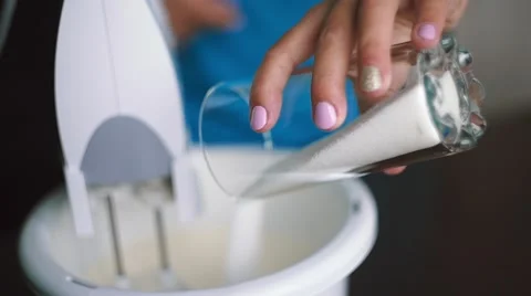 Baker makes batter and adds sugar Stock Footage 65949096