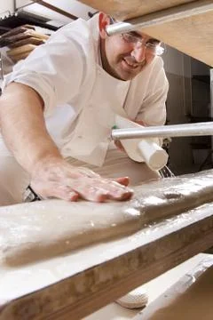 Baker makes the bread Stock Photos