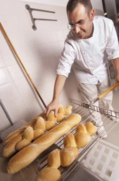 Baker makes the bread Stock Photos