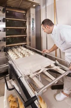 Baker makes the bread Stock Photos